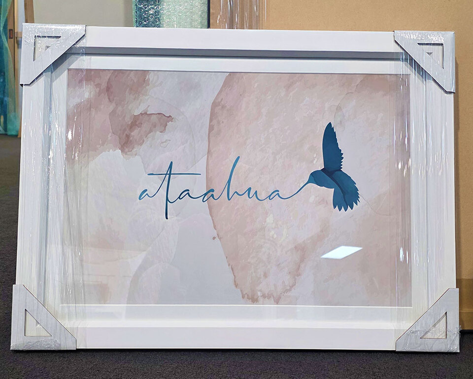 Maori art print of watercolour hummingbird writing ataahua in white frame by Willa Black Prints